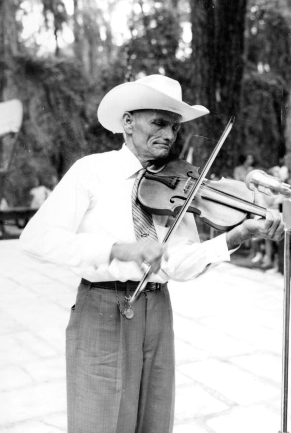Fiddler Zeke Stephens of Marianna performs during the 1956 Florida Folk Festival- White Springs, Florida