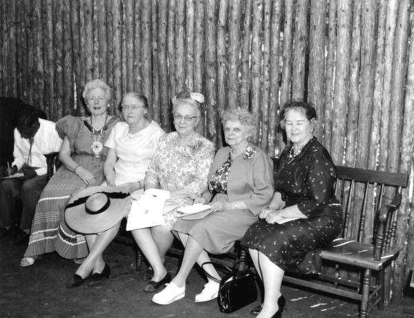 Group of women sitting with Seminole Indian Josie Billie at the Folk Festival- White Springs, Florida
