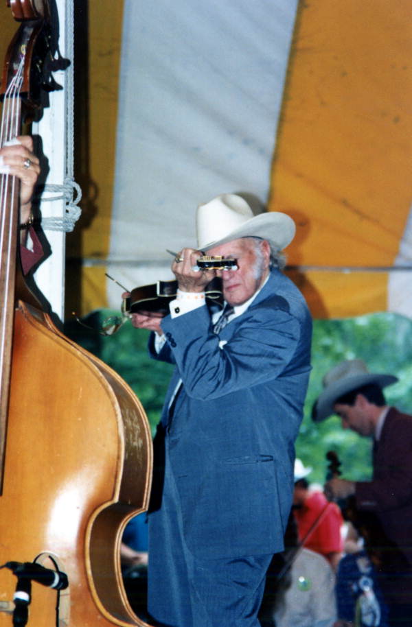 Bill Monroe performs at the Florida Folk Festival - White Springs, Florida .