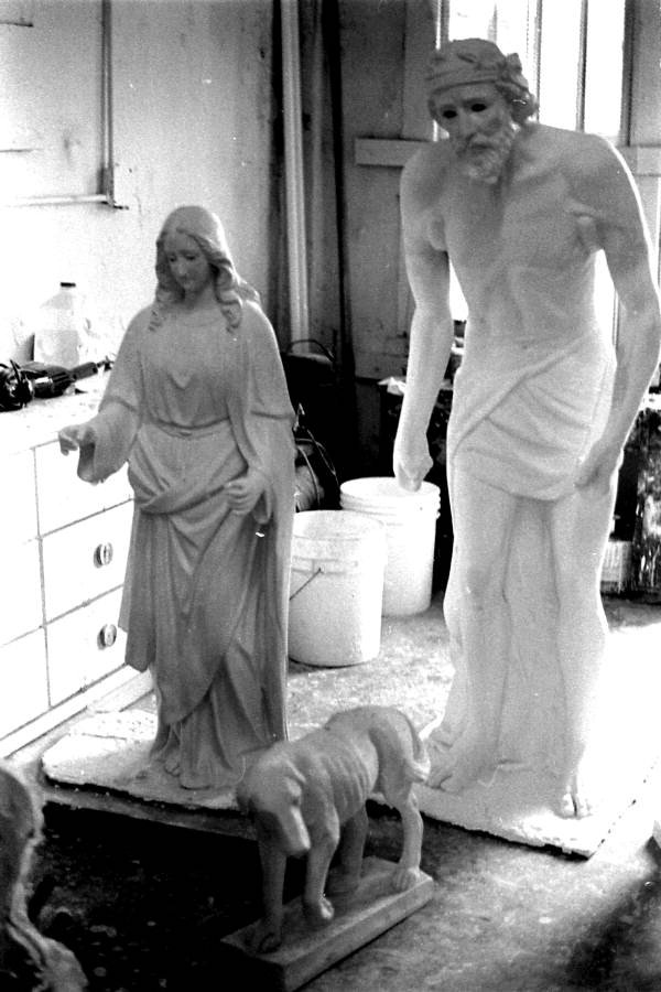 Completed plaster figures of saints drying - Miami, Florida.