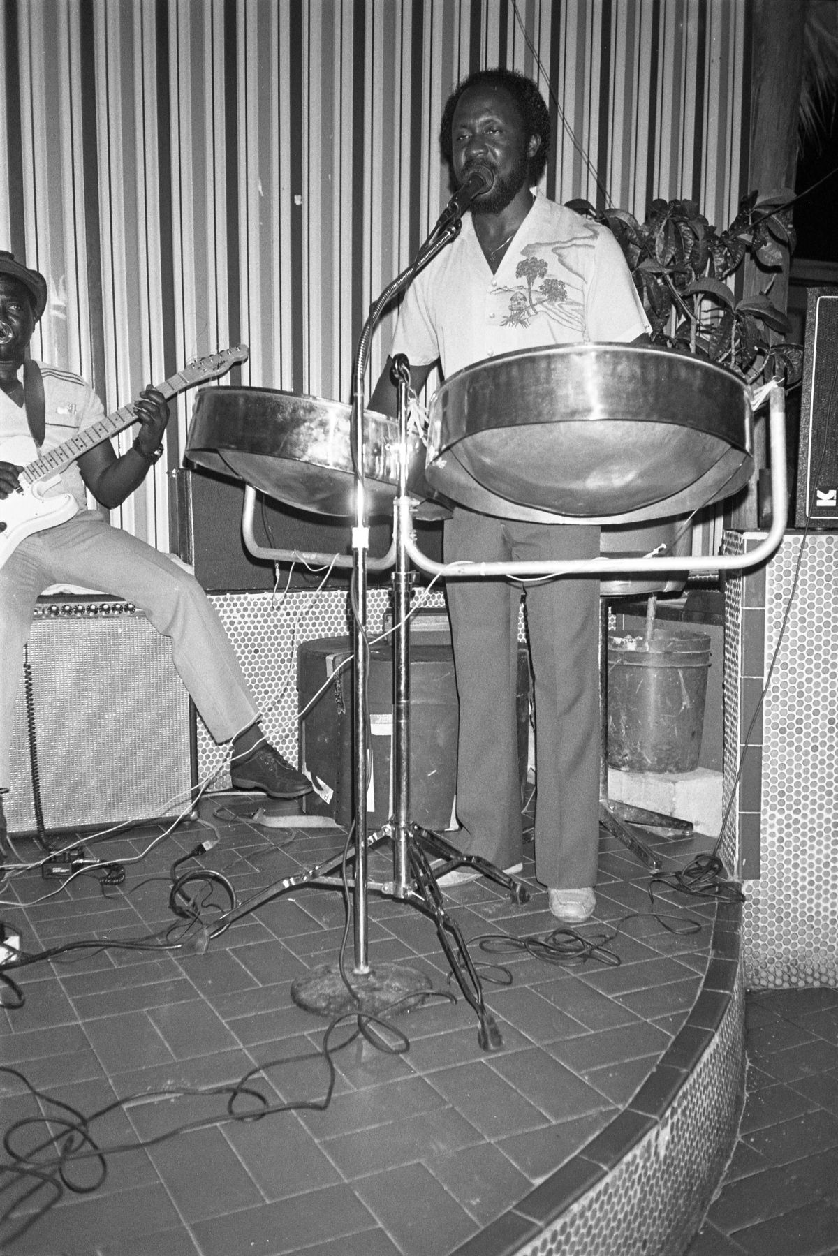 Haitian American man named Lucien playing steel drums at Aux Palmistes restaurant - Miami, Florida