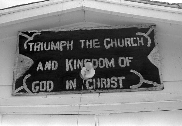 Sign above entrance to the "Triumph the Church and Kingdom of God in Christ" - Crescent City, Florida.
