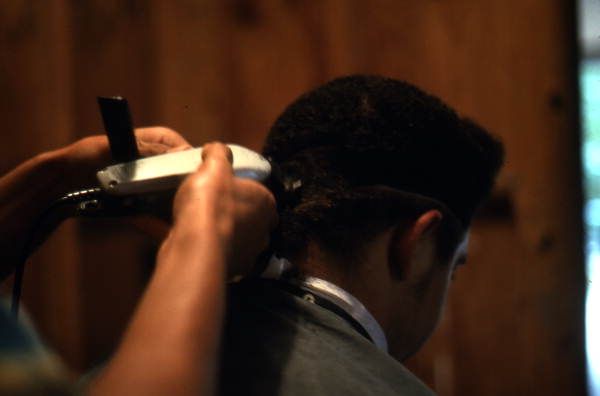 Isaac Moore getting his hair cut and styled- White Springs, Florida
