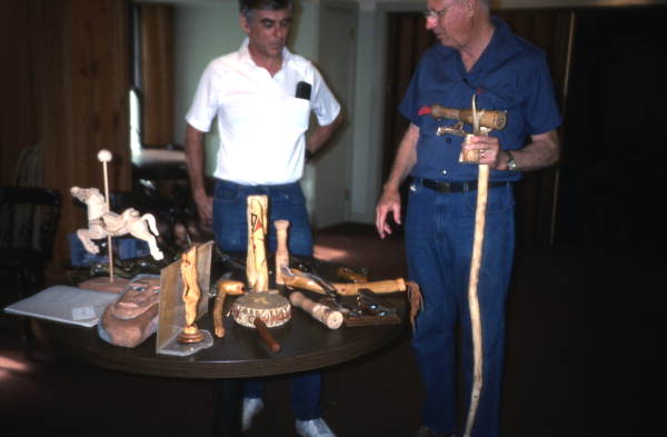 Students at Bobby Johns' cane making workshop looking at wood carvings they made- White Springs, Florida