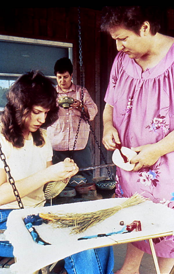 Women performing differing crafts