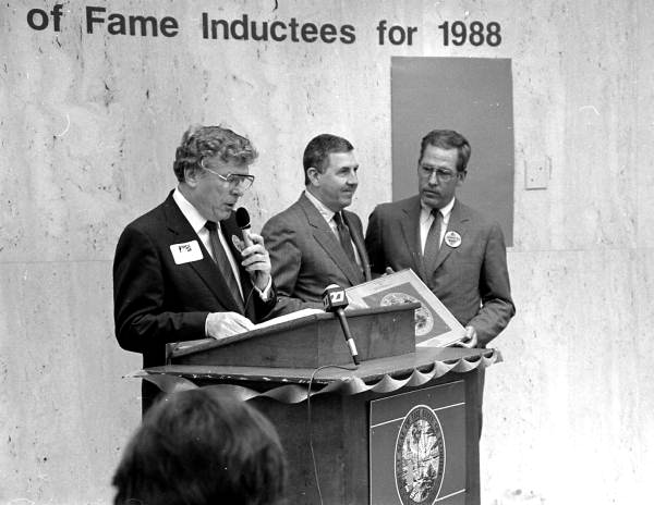 Florida Secretary of State Jim Smith (far right) presenting a Florida Artists Hall of Fame award in the rotunda of the Capitol building.