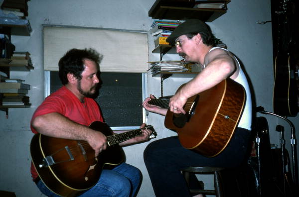 Blues guitarist Tampa Blue (R) teaching apprenctice Joseph Reina how to play blues guitar - Tampa, Florida.