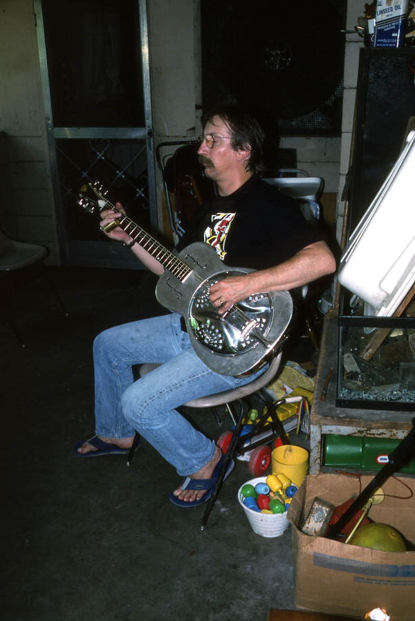 Tampa Blue playing slide blues guitar on a steel guitar- Tampa, Florida.