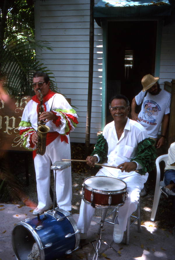 Cuban comparsa band members Hector Borroso (R) and Buddy Chaver performing- Key West, Florida.