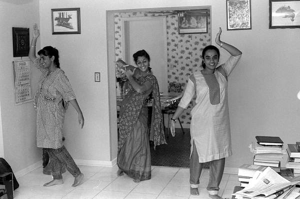 Nila Radhakrishnan (center) teaching apprentices Prema Menon (L) and Priya Menon East Indian dance- Dade City, Florida