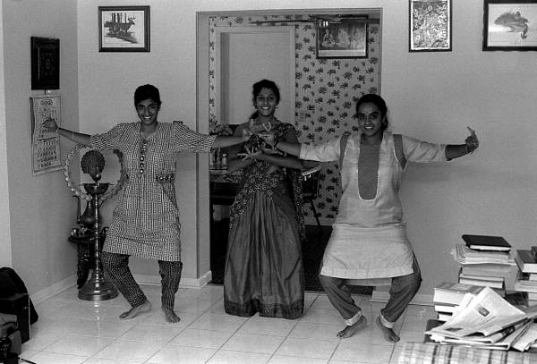 Nila Radhakrishnan (center) teaching apprentices Prema Menon (L) and Priya Menon East Indian dance- Dade City, Florida
