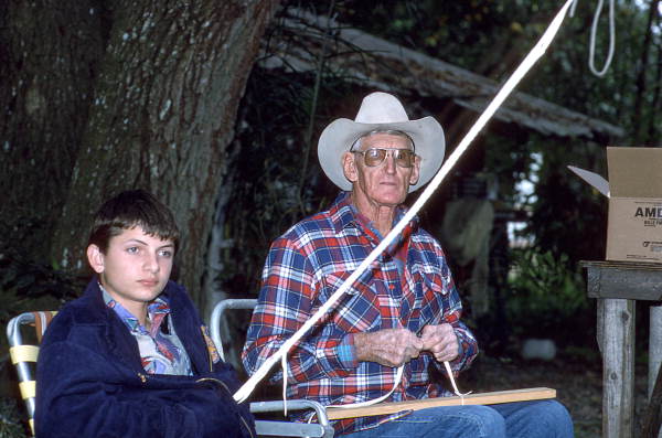 Cow whip maker George "Junior" Mills (r) and his apprentice J. Taylor Marcus working - Okeechobee, Florida.