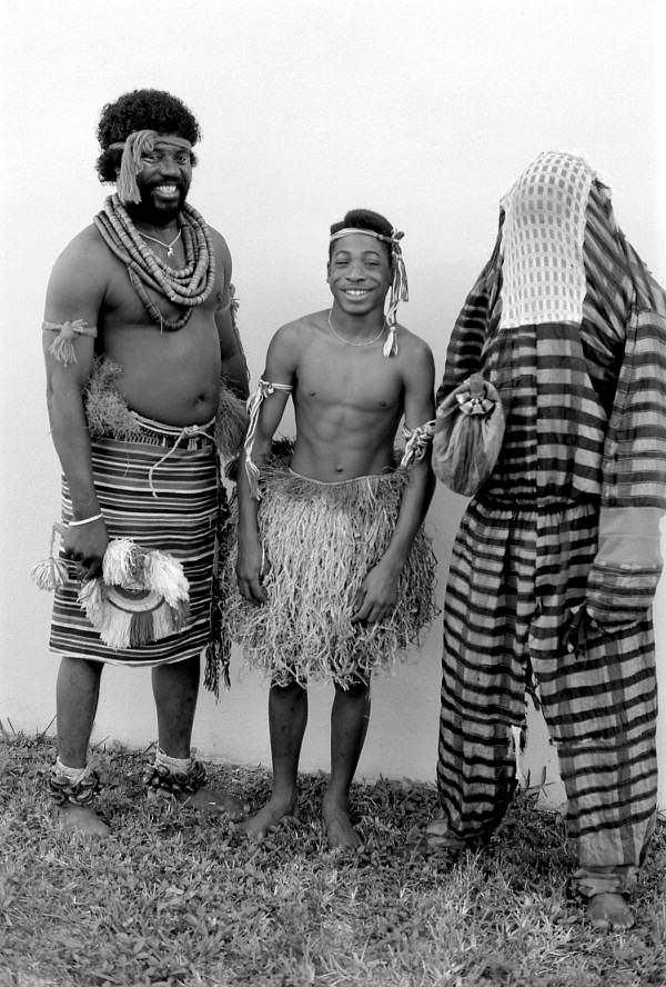 Nigerian acrobatic dancers Augustine (l) and Felix Omeben (r) with apprentice Akila Baki - North Miami, Florida.