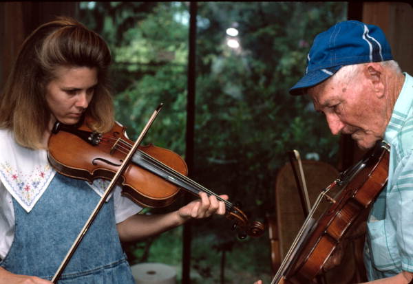 Trenda Slaughter learning oldtime fiddling from Willie David Jones - Old Town, Florida