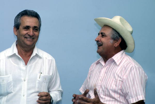 Cuban guajiro singer Meliton Perdomo, right, sings a decima to his apprentice Mario Brito - Medley, Florida.