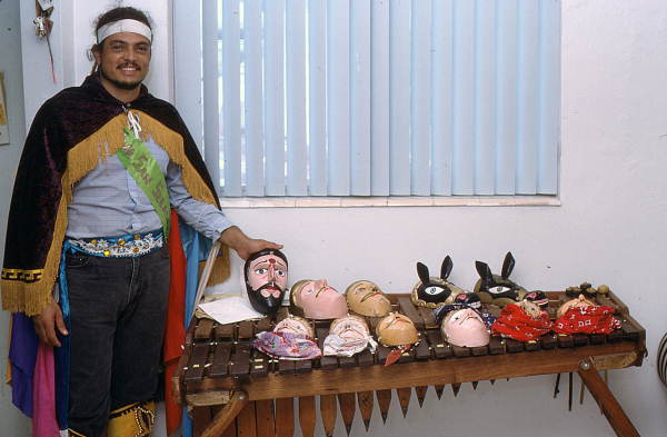 Nicaraguan American Jose Silva showing his masks - Pembroke Pines, Florida