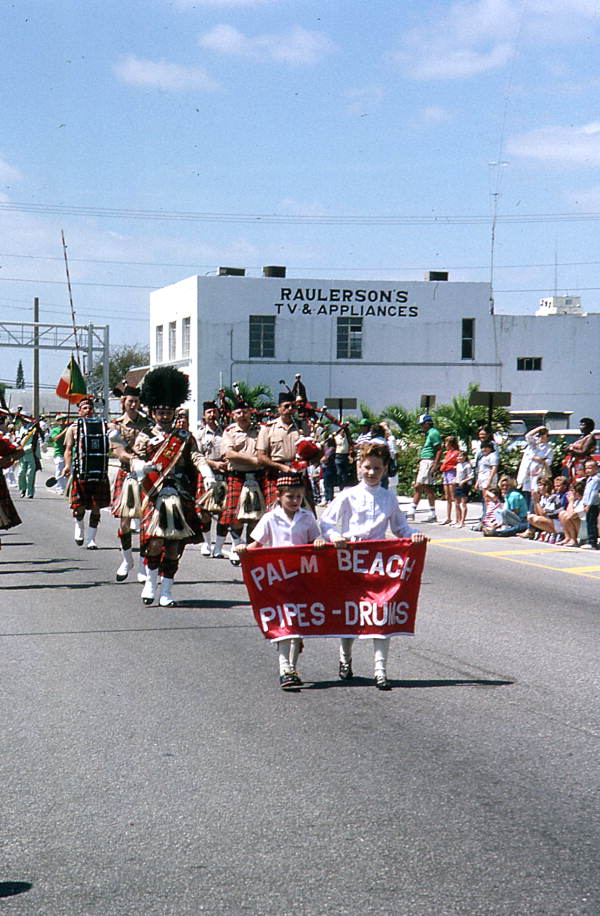 Palm Beach Pipes and Drums marching in St. Patrick's Day parade - Lake Worth, Florida.