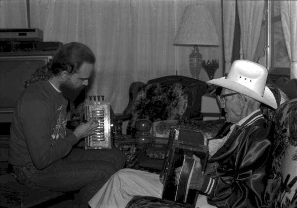 Joseph "Papa Joe" Arbie, Cajun accordion player, practicing with his apprentice Mike Stapleton of North Miami Beach - Live Oak, Florida.