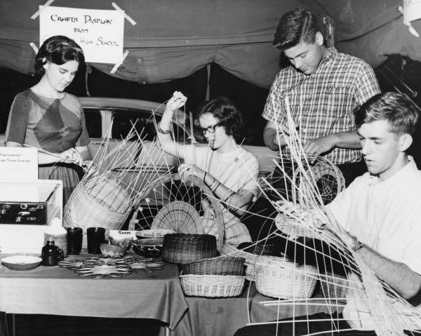 Teens weaving baskets - Florida.