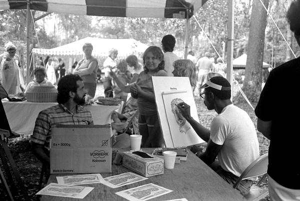 Artist Ellis Wright drawing a portrait at the 1984 Florida Folk Festival - White Springs, Florida