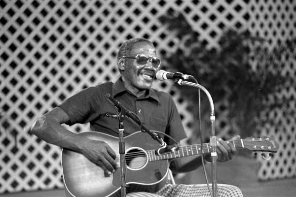 Albert "Buck" Thompson playing blues guitar at the 1985 Florida Folk Festival - White Springs, Florida