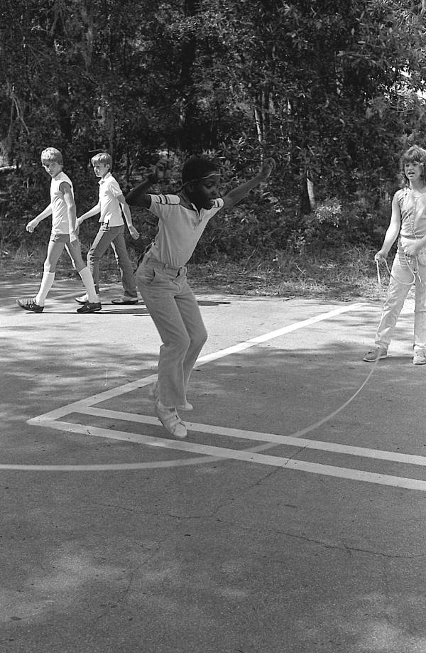 Children playing jump rope in the Children's Folklore Area at the 1985 Florida Folk Festival - White Springs, Florida