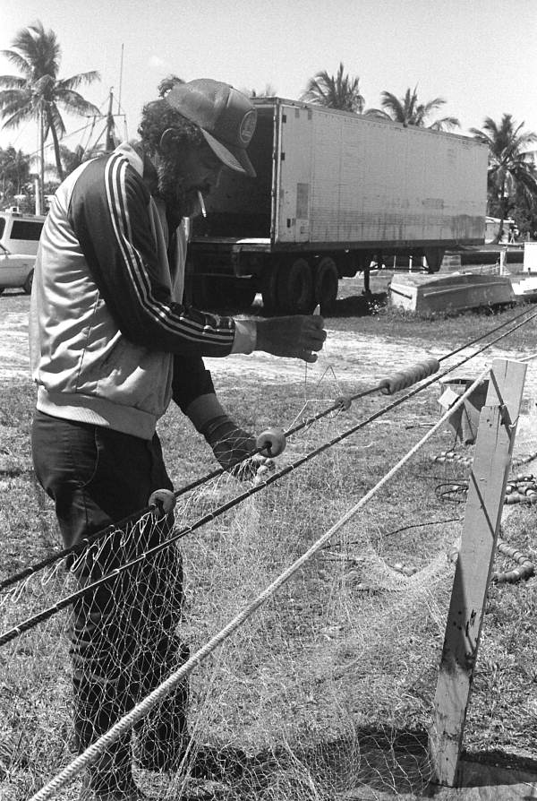 LaVon Gawn mending a fishing net - Pine Island, Florida