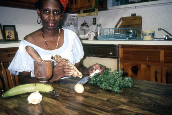 Liliane Louis preparing food - Miami, Florida.