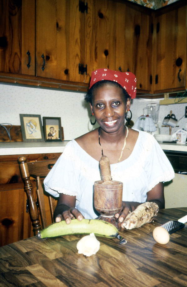 Liliane Louis preparing food - Miami, Florida