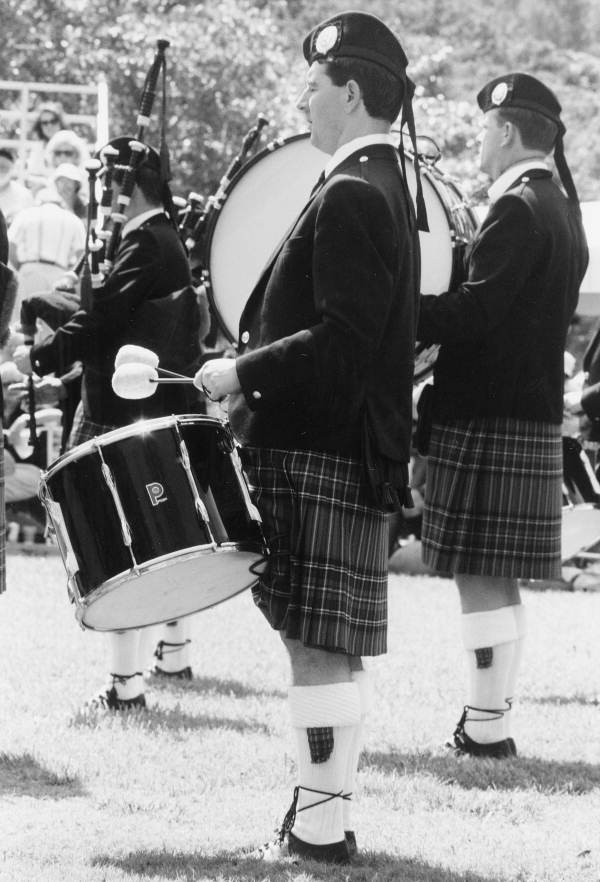 Drummers in Scottish band performing - Florida.