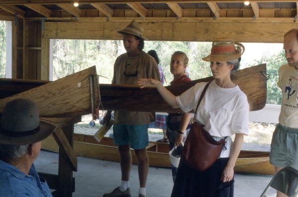 Glen Simmons, left, displaying his Everglades skiffs at the 1992 Florida Folk Festival - White Springs, Florida.