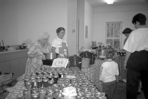 Marie Norris, left, and Ethel McDonald canning vegetables during Rural Folklife Days demonstrations - White Springs, Florida
