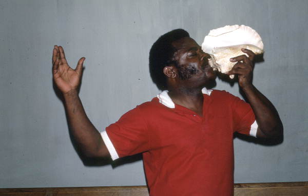 Limone Joseph demonstrating po lambi (shell) playing - Miami, Florida.