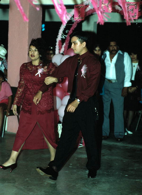 Two people step out on the dance floor - Dade County, Florida.