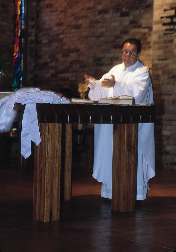 Priest holding a Quinceanera mass - Apopka, Florida