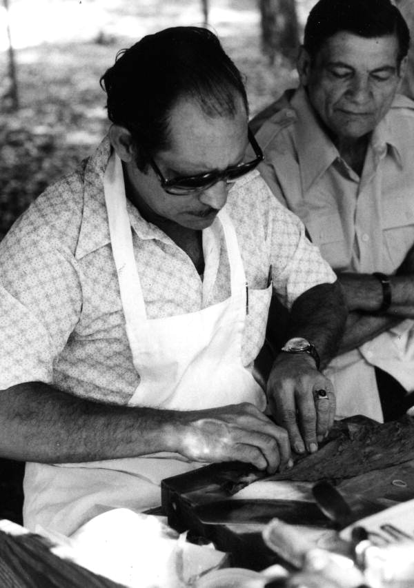 Pedro Gomez rolling a cigar