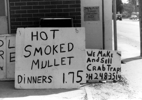Hand painted signs selling mullet and crab traps- Tampa, Florida