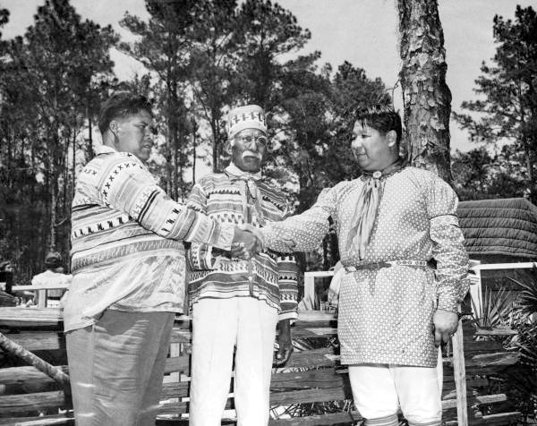 Seminole Indians Billy Osceola and Billy Bowlegs III with Creek Indian painter Fred Beaver at the 1954 Florida Folk Festival - White Springs, Florida