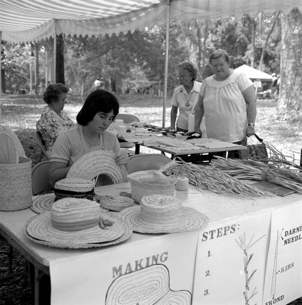 Pam Solano weaving palm hats at the 1983 Florida Folk Festival - White Springs, Florida