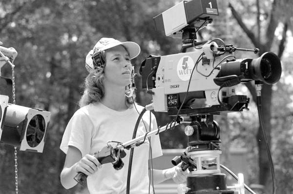 Camerawoman from WUFT-TV recording at the 1983 Florida Folk Festival - White Springs, Florida