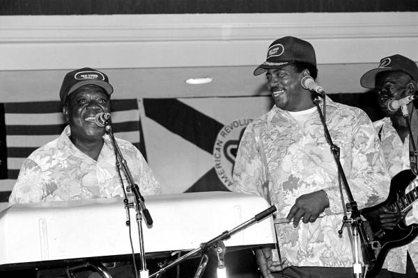 Key West Island Junkanoos performing calypso music at the 1983 Florida Folk Festival - White Springs, Florida