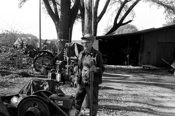 Lloyd Earl McMullian at his farm with antique engines - Two Egg, Florida