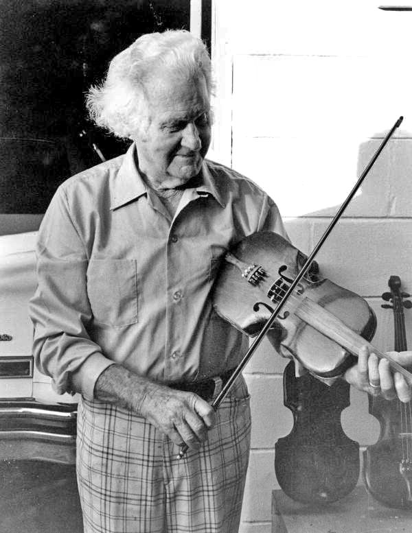 Troy Lovelace playing fiddle he made : Tampa, Florida.