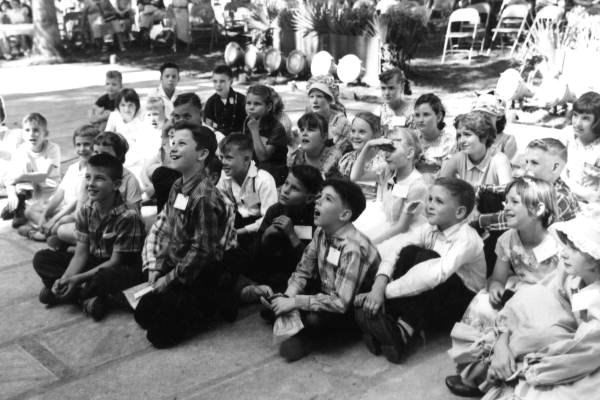 Boys and girls watching the Punch and Judy puppet show- White Springs, Florida