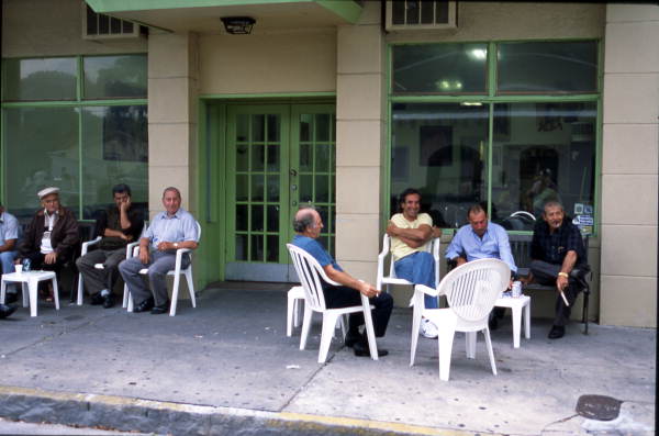 Men outside Angel's Coffee House - Tarpon Springs, Florida.