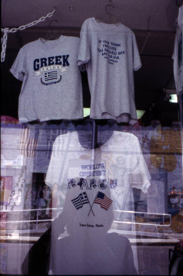 T-shirts in a tourist shop window - Tarpon Springs, Florida.