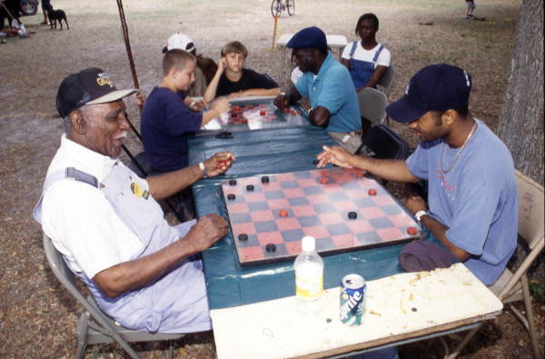 Opponents play checkers at the Florida Folklife Festival - White Springs, Florida.
