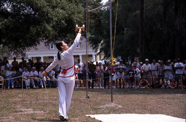 Nan Zhu performs with her Chinese Yo-yo's- White Springs, Florida.