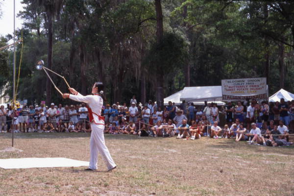 Nan Zhu performs with her Chinese Yo-yo's - White Springs, Florida.