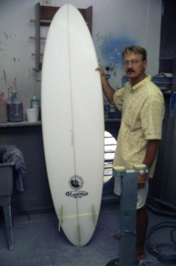Pat Madden with a surfboard - Saint Augustine, Florida.